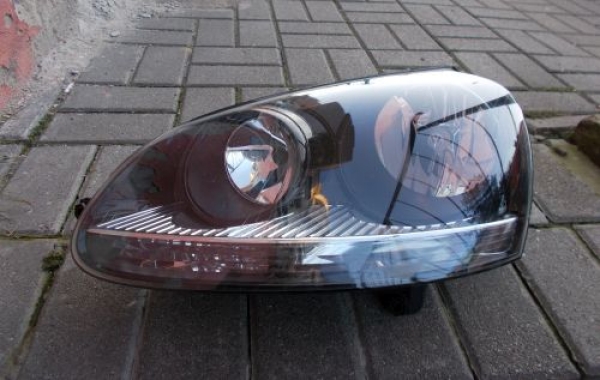 Volkswagen - Golf V - Kombi - (2007 - 2009) - Oświetlenie / Lampa przednia lewa