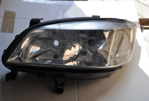 Opel - Zafira A - (2003 - 2005) - Oświetlenie / Lampa przednia lewa