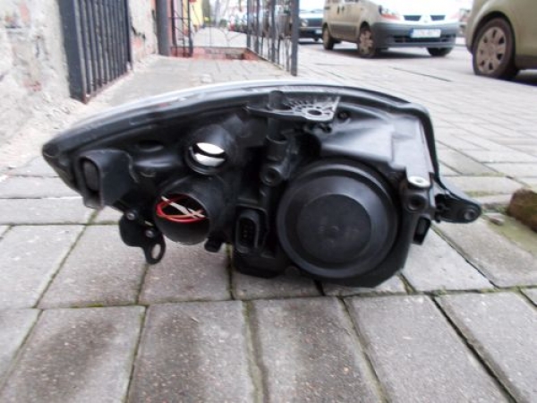 Skoda - Fabia - 5 drzwi - (2010 - 2014) - Oświetlenie / Lampa przednia lewa