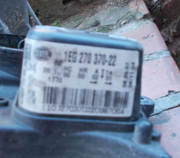 Opel - Astra - H - 3 drzwi - (2004 - 2007) - Oświetlenie / Lampa przednia prawa