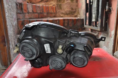 Volkswagen - Polo - 5 drzwi - (2005 - 2009) - Oświetlenie / Lampa przednia lewa