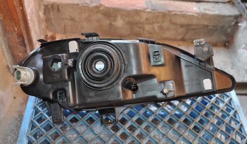 Renault - Megane - Kombi - (1999 - 2003) - Oświetlenie / Lampa przednia lewa