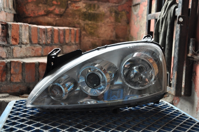 Opel - Corsa - C - 3 drzwi - (2003 - 2006) - Oświetlenie / Lampa przednia lewa