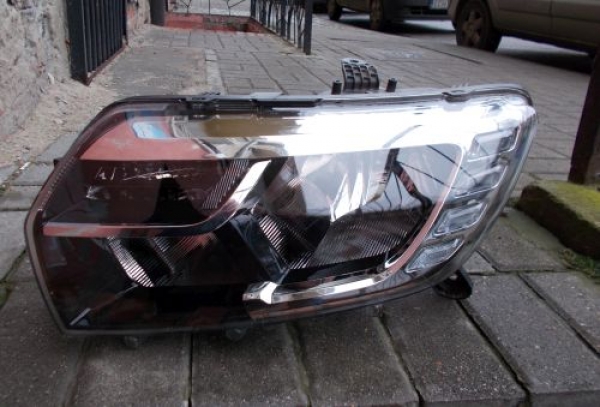 Dacia - Logan - (2013-) - Oświetlenie / Lampa przednia lewa