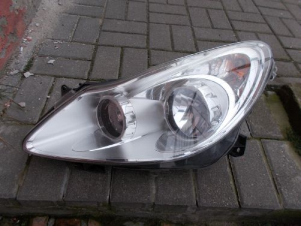 Opel - Corsa - D - 5 drzwi - (2006 - 2011) - Oświetlenie / Lampa przednia lewa