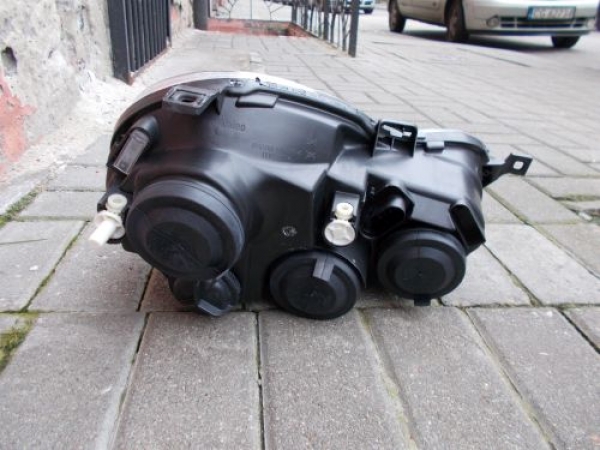 Volkswagen - Polo - 5 drzwi - (2001 - 2005) - Oświetlenie / Lampa przednia lewa
