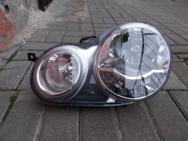 Volkswagen - Polo - 5 drzwi - (2001 - 2005) - Oświetlenie / Lampa przednia lewa