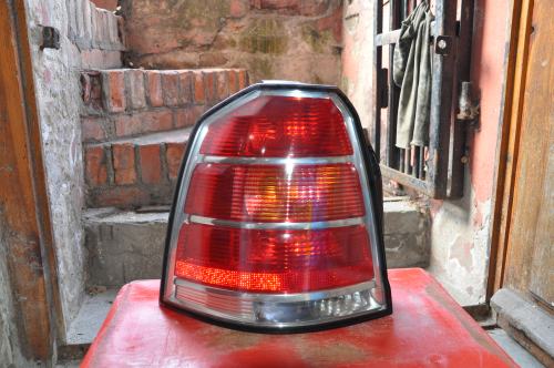 Opel - Zafira B - (2005 - 2008) - Oświetlenie / Lampa tylna lewa