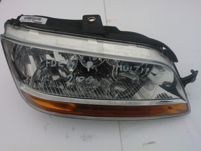Fiat - Idea - (2003 - 2008) - Oświetlenie / Lampa przednia lewa