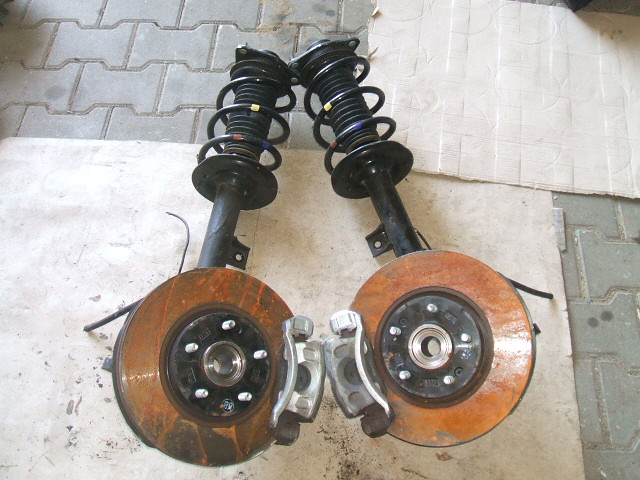 Kia - Sportage - (2010 - 2015) - Zawieszenie / Zwrotnica lewa