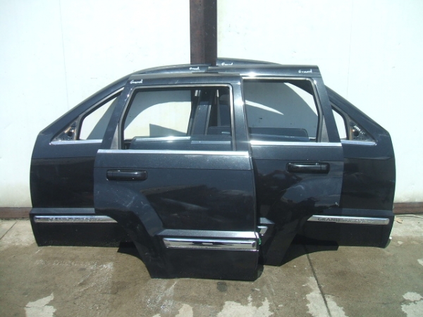 Jeep - Cherokee Grand - WK - (2005 - 2008) - Karoseria / Drzwi tylne lewe