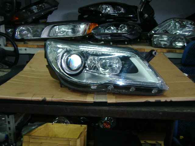 Volkswagen - Tiguan - (2007 - 2011) - Oświetlenie / Lampa przednia  prawa Bixenon