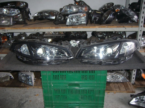 Renault - Laguna - Kombi - (2005 - 2007) - Oświetlenie / Lampa przednia   lewa Xenon