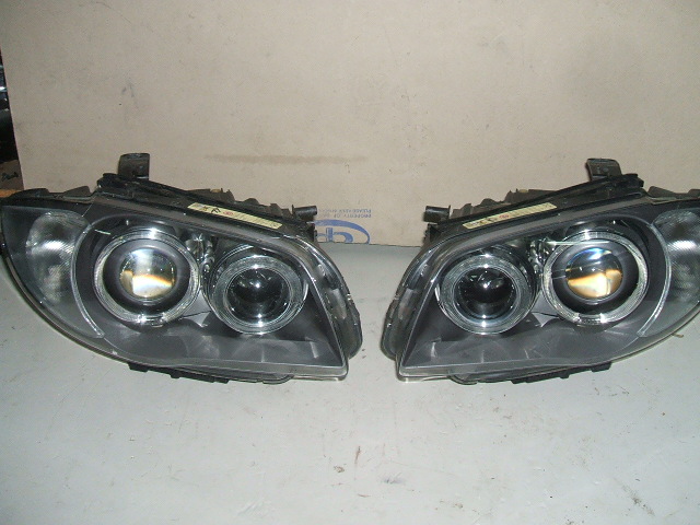 BMW - Seria 1 -  E81 - 3 drzwi - (2007 - 2011) - Oświetlenie / Lampa przednia  prawa Bixenon