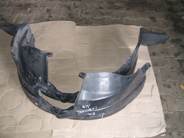 Kia - Carnival II - (2005 - 2010) - Karoseria / Nadkole plastikowe lewe przednie