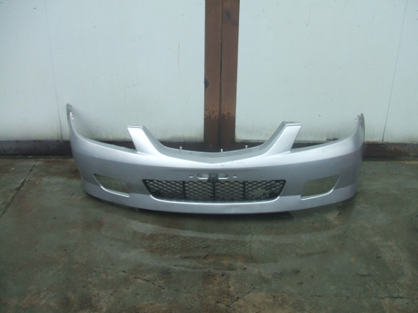 Mazda - 323 S - 4 drzwi - (2000 - 2002) - Karoseria / Zderzak przedni