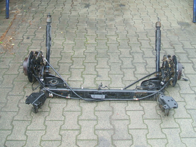 Nissan - Tiida - 5 drzwi  - (2008 - 2011) - Zawieszenie / Kompletne tylne