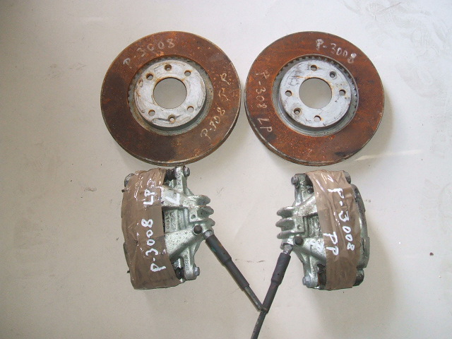 Peugeot - 3008 - (2009 - 2013) - Hamulce / Zacisk hamulcowy przedni prawy