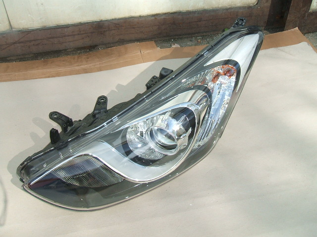 Hyundai - i30 - Kombi - (2012 - 2015) - Oświetlenie / Lampa przednia lewa