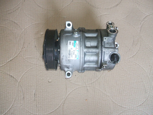 Opel - Astra - J - Kombi - (2010 - 2015) - Układ chłodzenia / Klimatyzacja - sprężarka