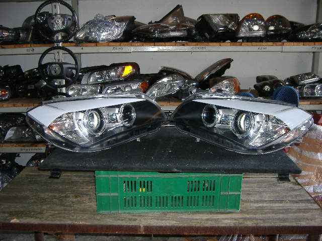 BMW - X1 - (2009 - 2012) - Oświetlenie / Lampa przednia  lewa Bixenon