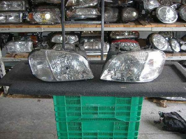 Mazda - Tribute - (2004 - 2008) - Oświetlenie / Lampa przednia prawa