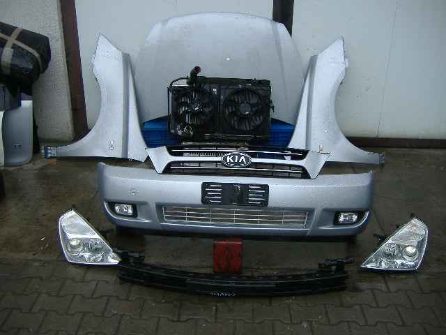 Kia - Carnival II - (2005 - 2010) - Oświetlenie / Lampa przednia lewa