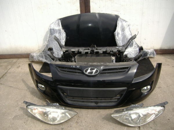 Hyundai - i20 - 5 drzwi - (2008 - 2012) - Oświetlenie / Lampa przednia lewa