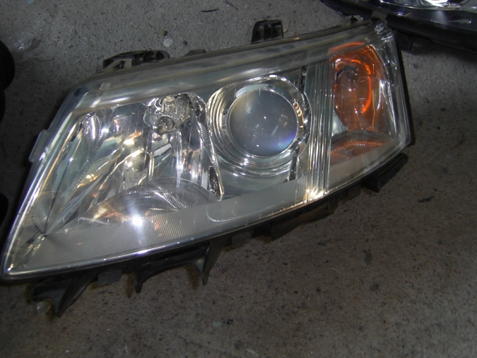 Saab - 9-3 - SportCombi - (2005 - 2007) - Oświetlenie / Lampa przednia   lewa Xenon